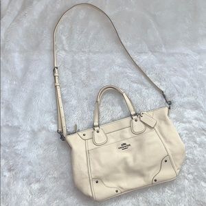 Gently used off-white Coach purse